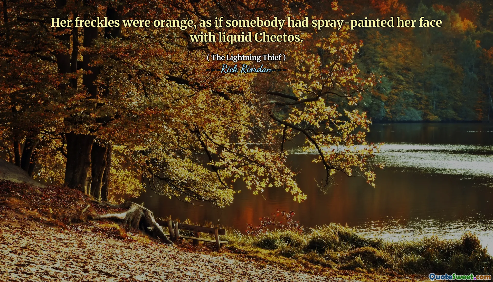 Her freckles were orange, as if somebody had spray-painted her face with liquid Cheetos.