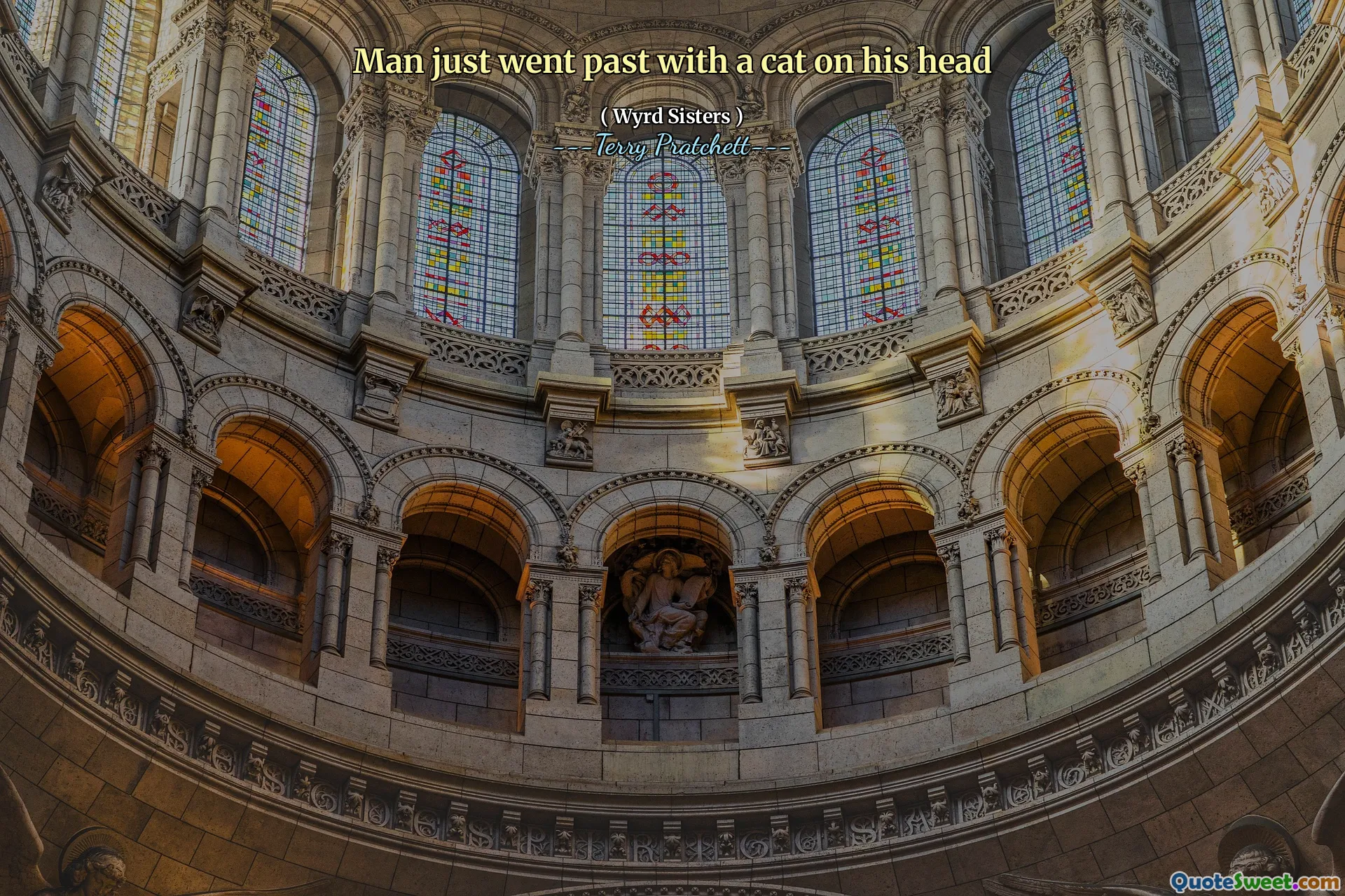 Man just went past with a cat on his head