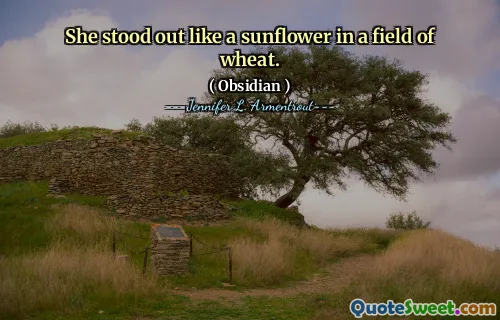 She stood out like a sunflower in a field of wheat.