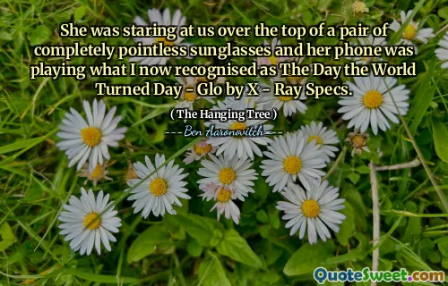 She was staring at us over the top of a pair of completely pointless sunglasses and her phone was playing what I now recognised as The Day the World Turned Day - Glo by X - Ray Specs.